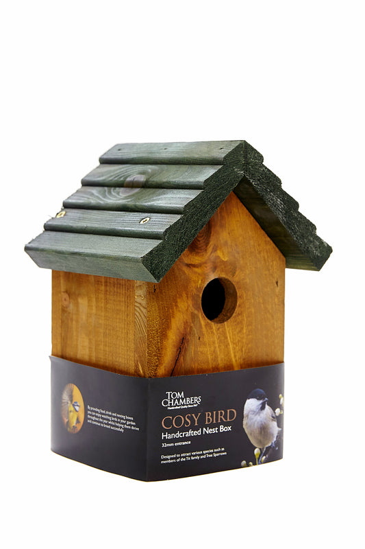 Wooden cosy bird nest box by tom chambers with green roof
